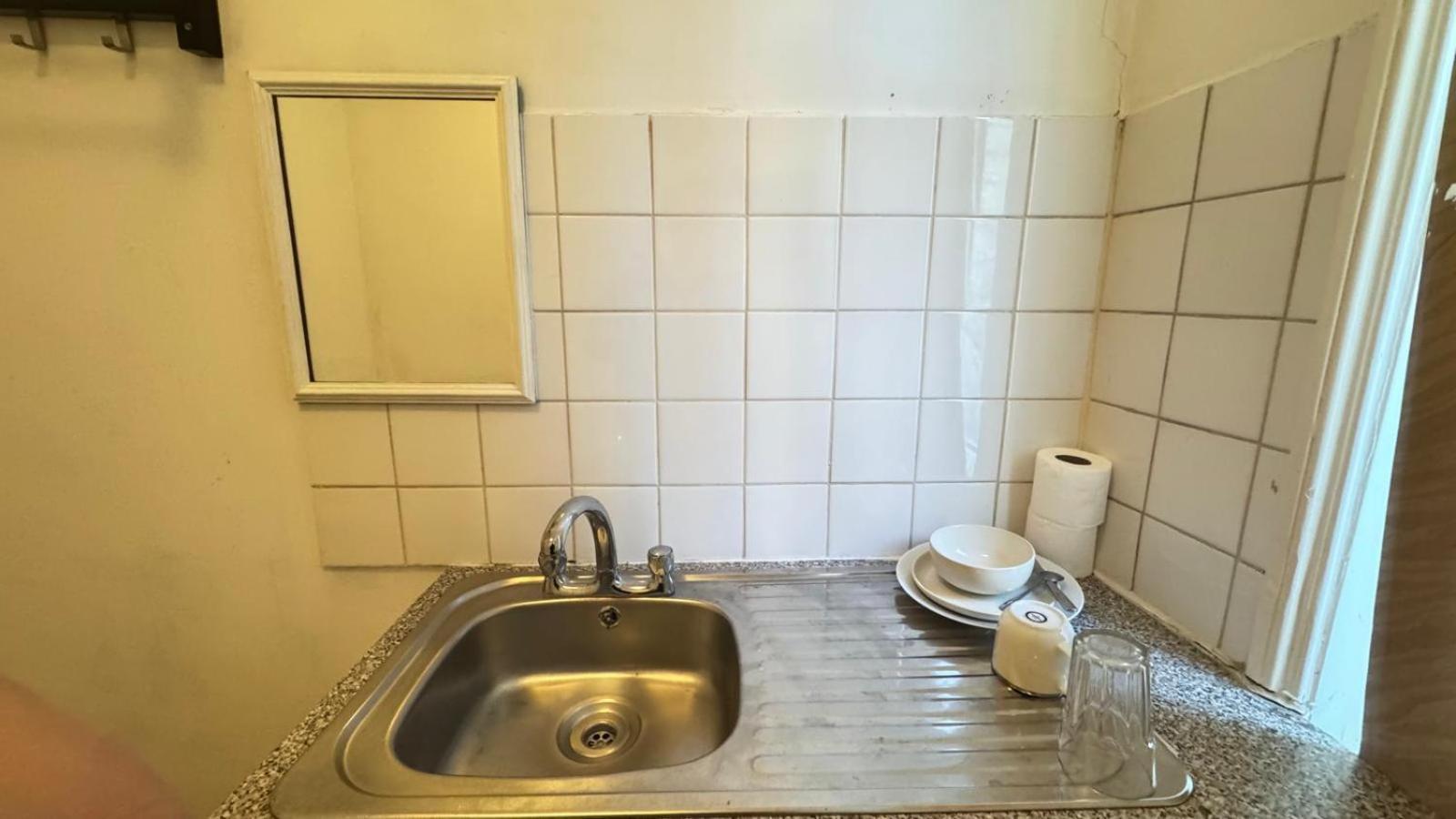 Habitación Individual con baño compartido