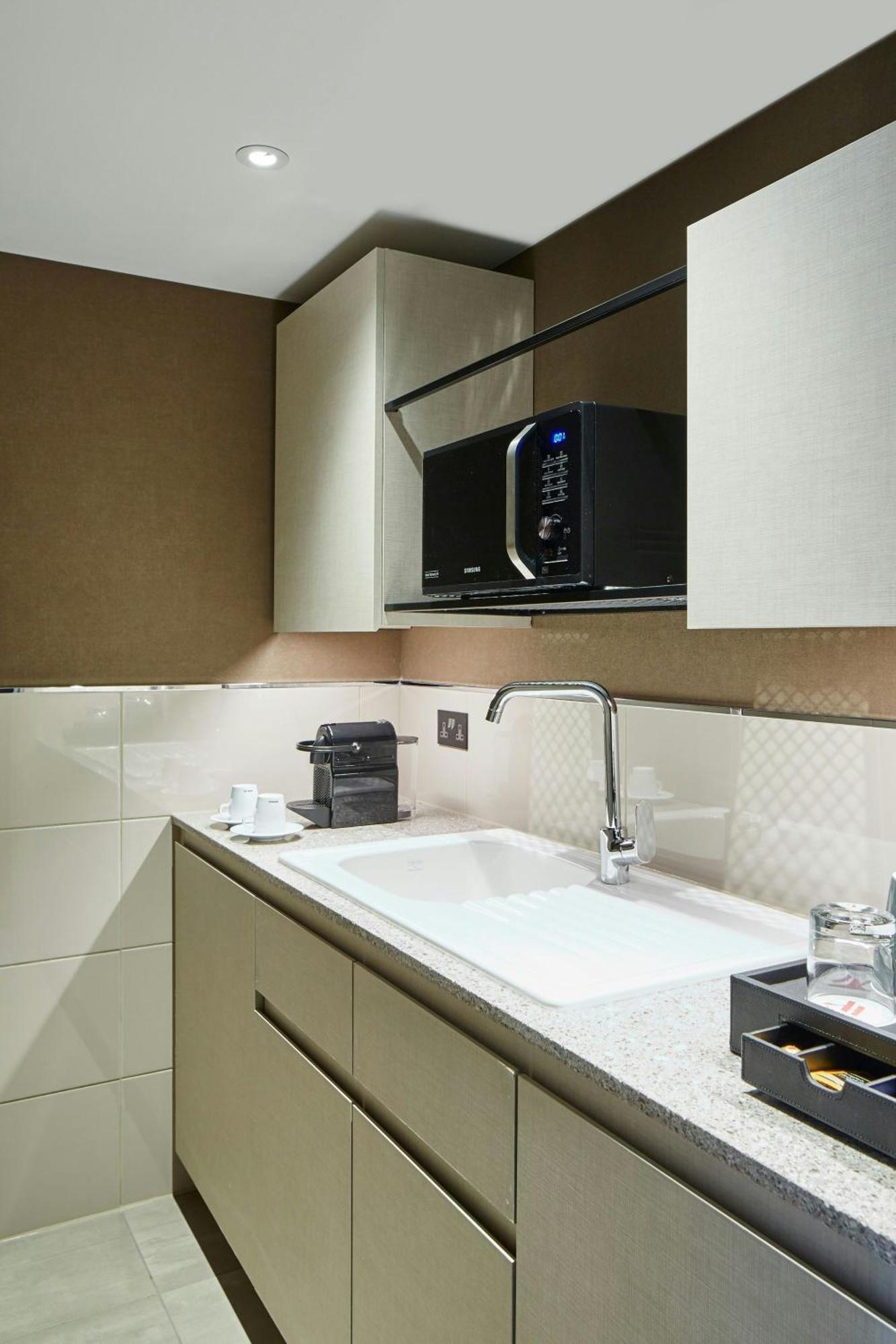 Suíte de Canto de 1 Quarto com Terraço e Acesso ao M Club Lounge
