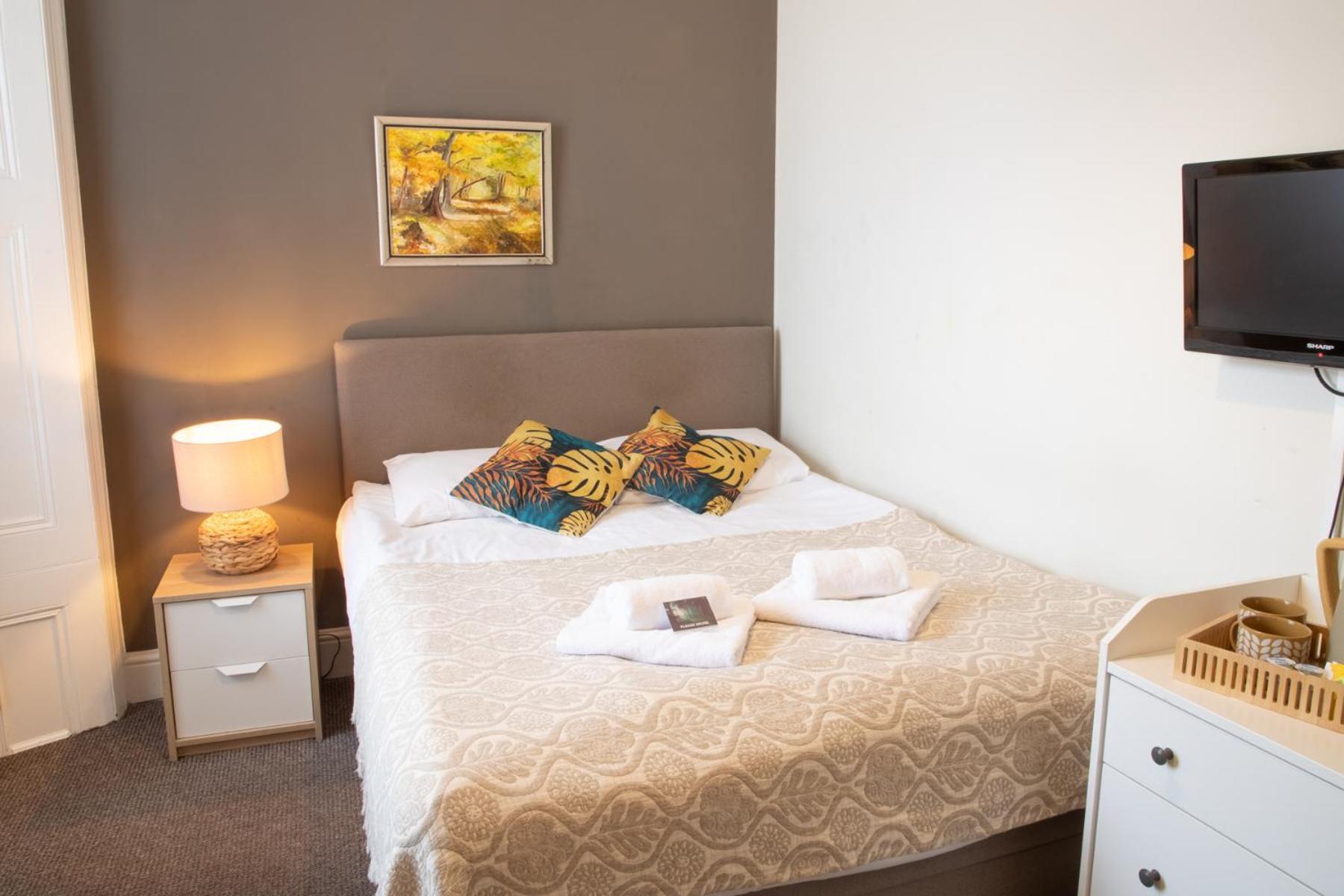 Quarto Duplo com Banheiro Compartilhado