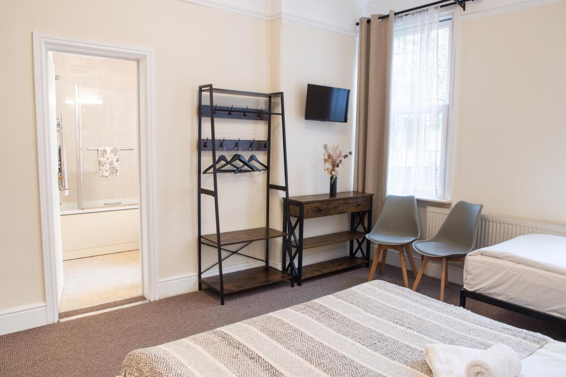 Quarto Família com Banheiro (4 Adultos)